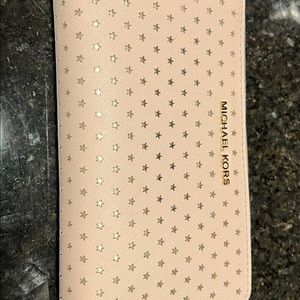 Michael Kors light pink wallet with gold stars